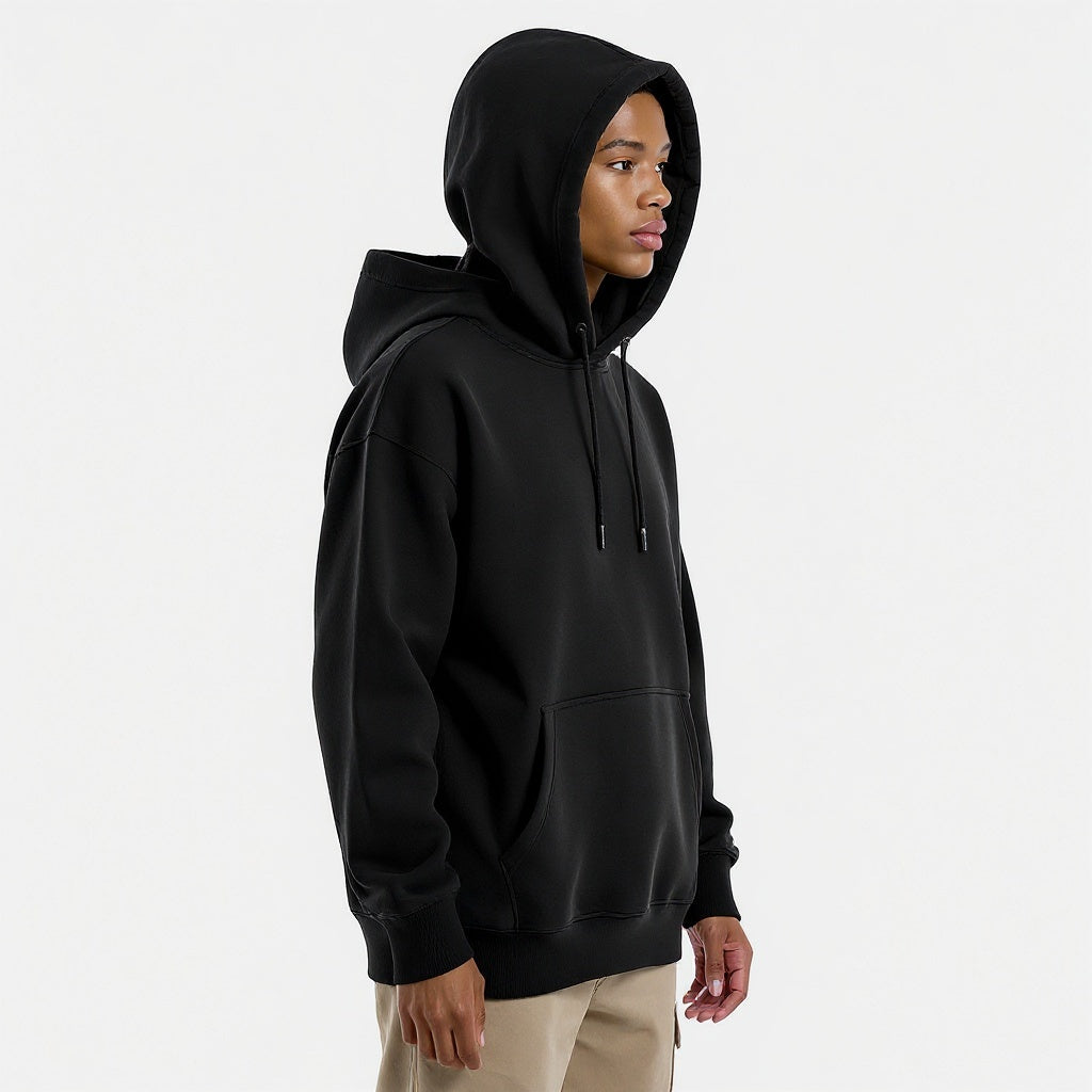 Unisex hoodie from alternative angle showing side profile and relaxed fit