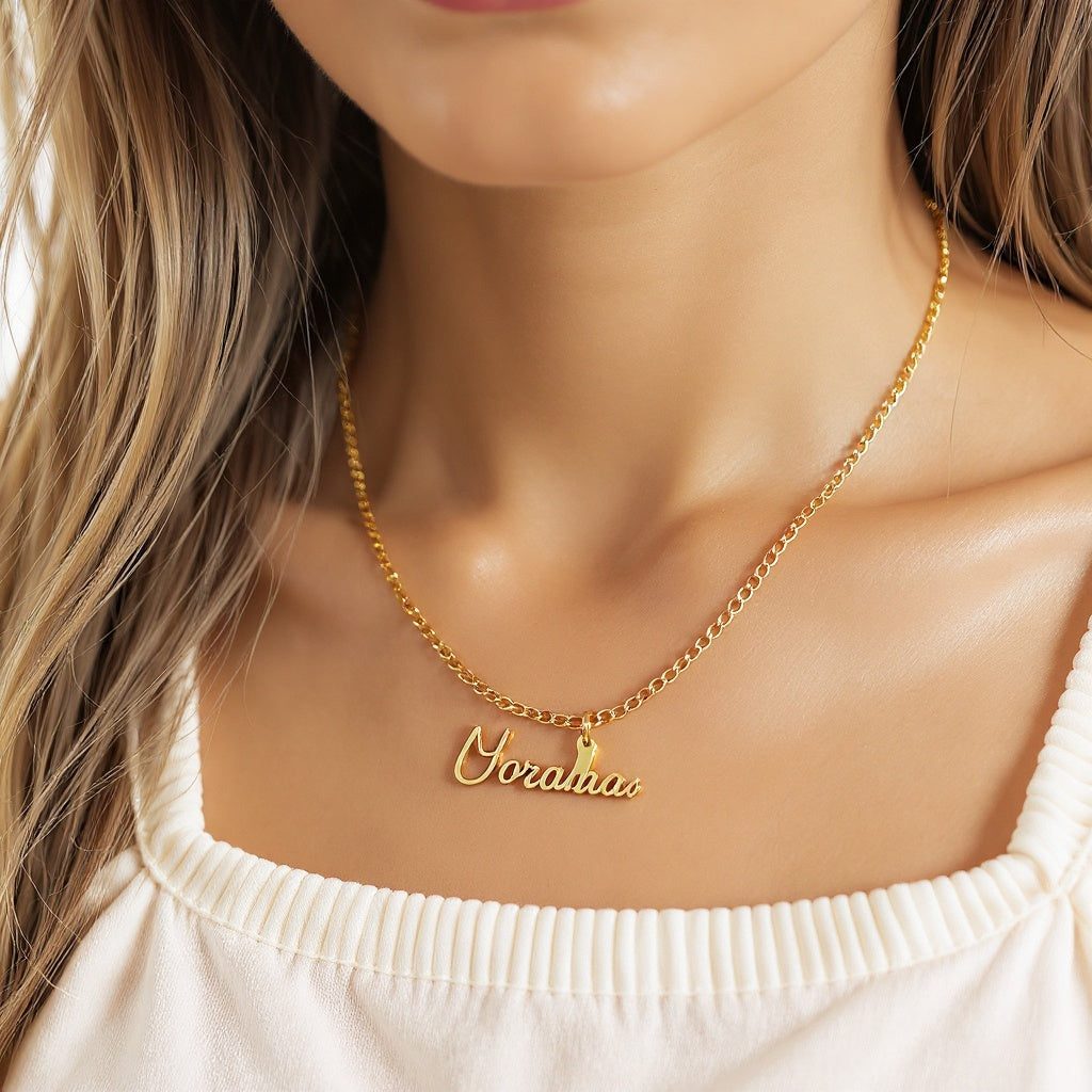 Close-up of gold-filled chain texture on Name Necklace, macro detail shot