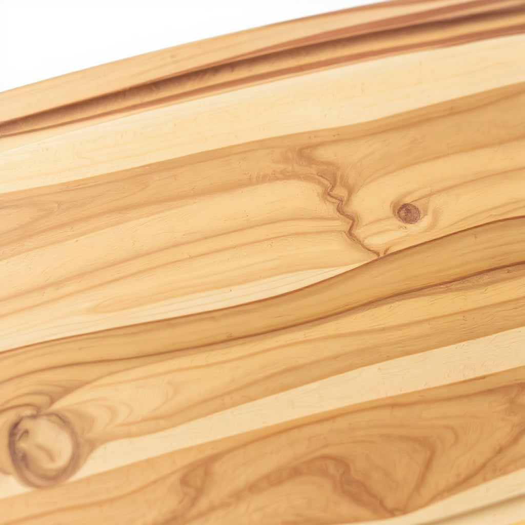 Close-up of engraved surface on maple wood cutting board, macro texture shot