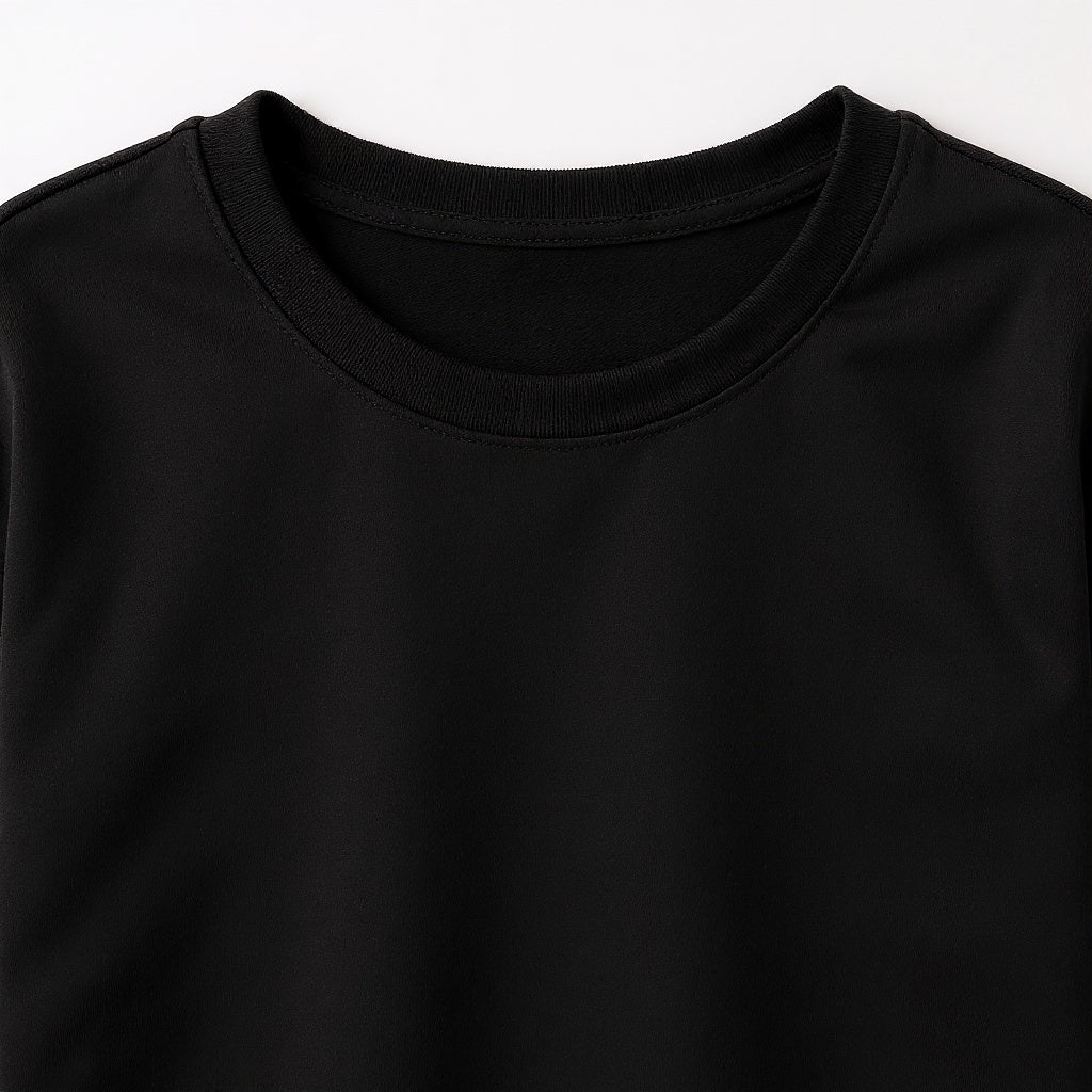 Close-up of cotton fabric texture on black t-shirt, macro detail shot