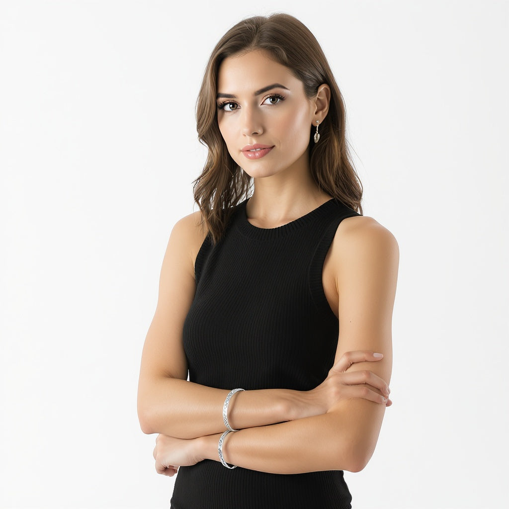 Hero shot of sterling silver cuff bracelet on white studio background, full product visible