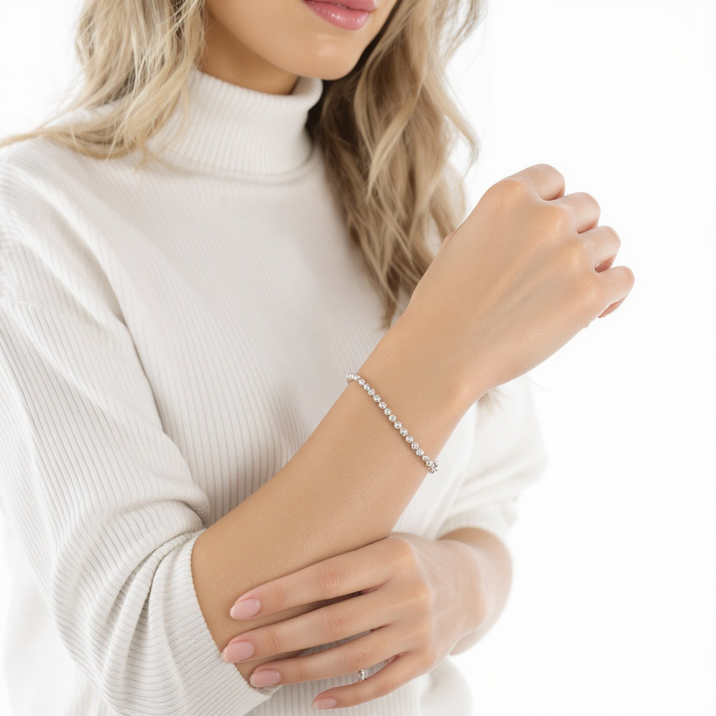 Hero shot of Sterling Silver Charm Bracelet on white studio background, full product visible