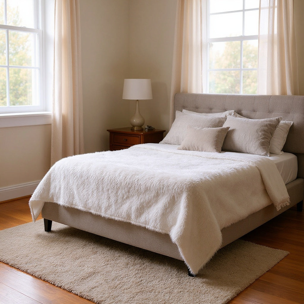 Fleece Photo Blanket in a bedroom setting, showcasing its softness and warmth, editorial style